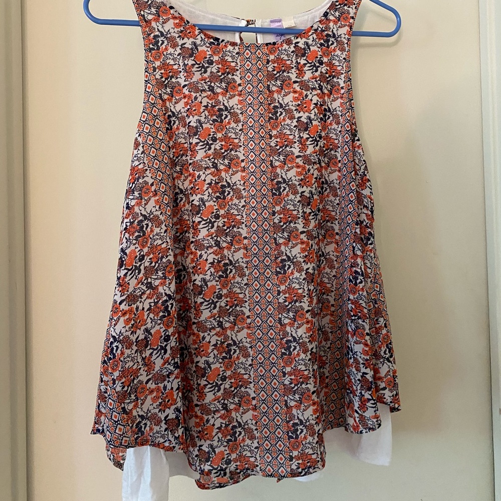 Francesca’s sleeveless blouse